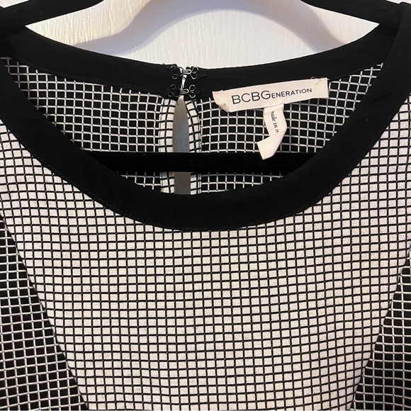 BCBGeneration Black and White Peplum Top - Picture 6 of 7